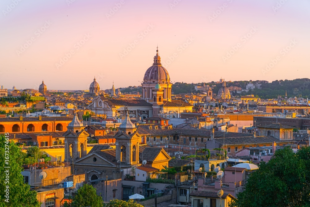 Fototapeta premium Sunset light over the rooftops of Rome