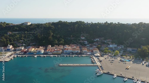 Wallpaper Mural Aerial establish of Katakolo Port with calm waters, empty docks and sailboats anchored on pier, coastline in Greece Torontodigital.ca