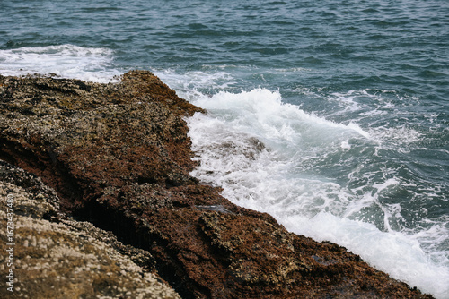 The sea hits the rocks on the Yongmeori Coast.