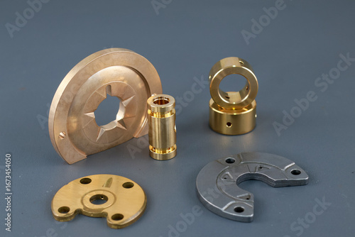 Fotografie Service kit or Repair kit Turbo charger, including a thrust washer, bushing, bearing journal isolated on grey background