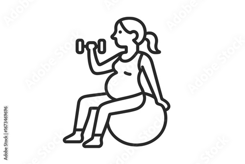 Pregnant woman exercising with dumbbell and stability ball