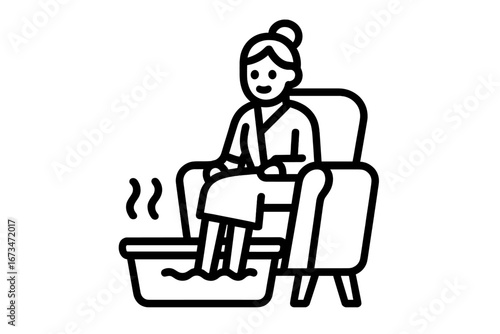 Relaxing foot spa treatment in a cozy chair at home