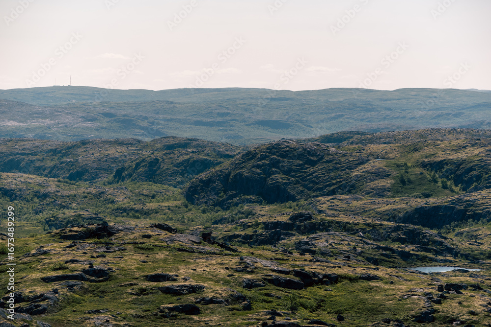 Obraz premium landscape Russian North view in the tundra with a mountain river and a lake in the mountains