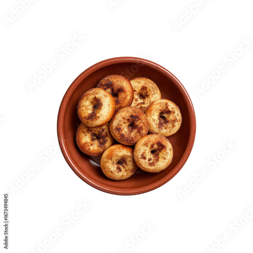 Overhead Shot of Cinnamon Sugar Donut Holes in a Rustic Bowl