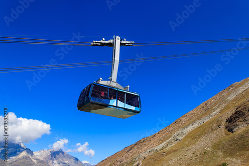 Overhead cable car to the Rothorn mountain near Zermatt in Switzerland