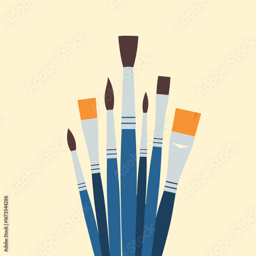 A collection of various paintbrushes with blue handles and different shaped bristles, against a light yellow background.