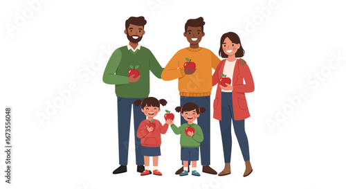 A family of two parents and two children holding apples and standing close to each other