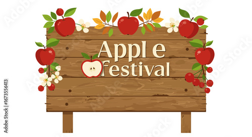 A wooden sign announcing an Apple Festival decorated with apples leaves and flowers