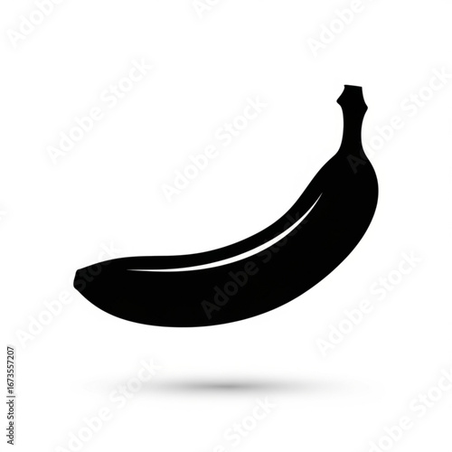 Simple black silhouette of a banana with a shadow