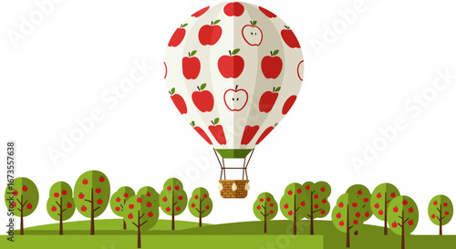 Applethemed hot air balloon floating over a field of apple trees
