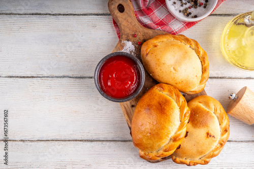 Wallpaper Mural Homemade golden baked hand pies, with meat filling Torontodigital.ca