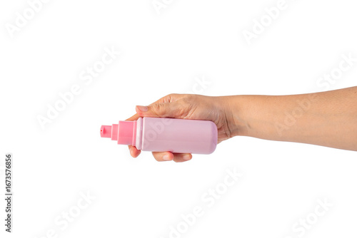 Pink product bottle in hand on transparent background