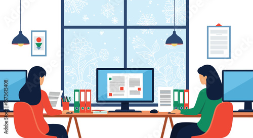 Women collaborate on projects at desks with computers before a snowy winter window