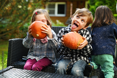 Kids with pumpkins