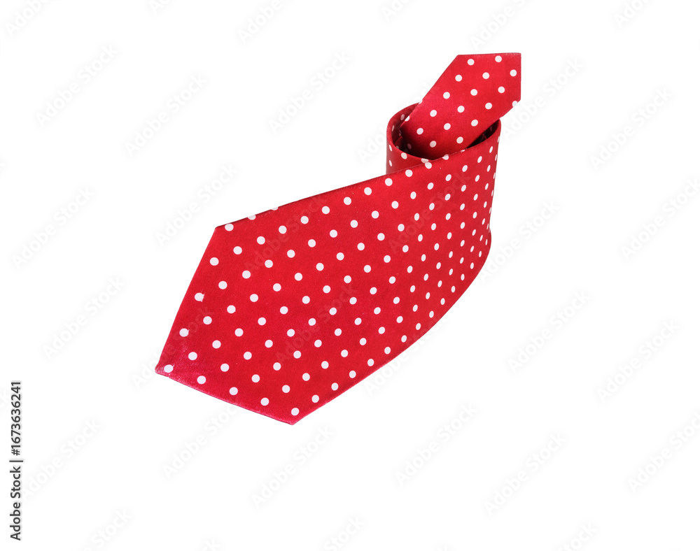 Obraz premium Rolled red silk polka dot necktie isolated on white background.