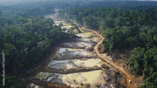 Congo – 4K Drone Aerial of Gold Mining Industry in Rainforest at Sunset