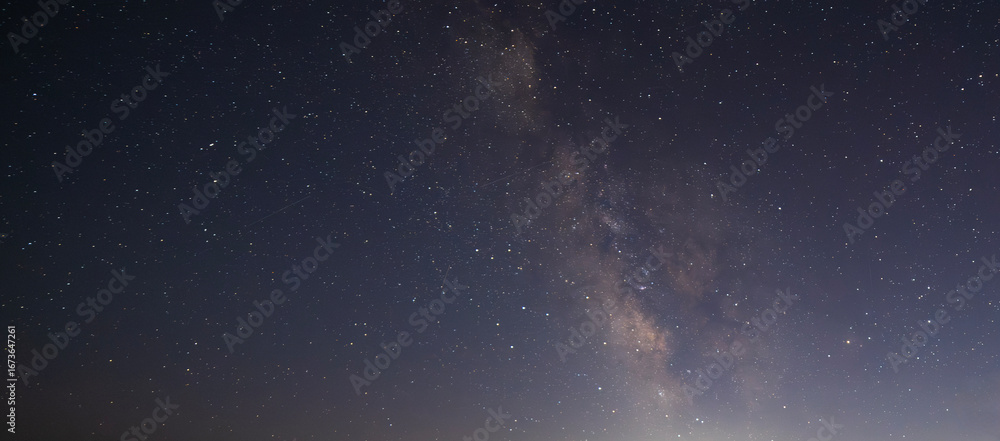 Obraz premium Beautiful bright Milky Way galaxy on the starry sky. Night sky astronomical background. 