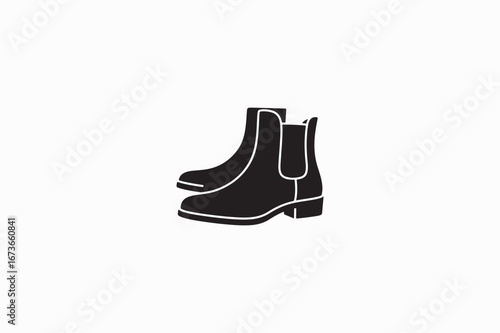 A Chelsea Boots Shoes vector silhouettes black image with white color back round made by adobe illustrator.eps