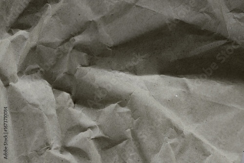 Brown crumpled recycled paper texture background. Kraft Paper