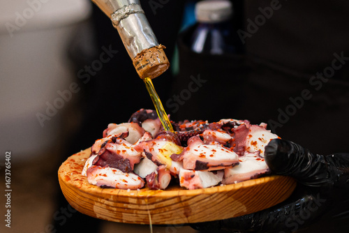 Octopus Fair in Galicia. Octopus cooked with oil, paprika, and salt. Close-up of octopus.
