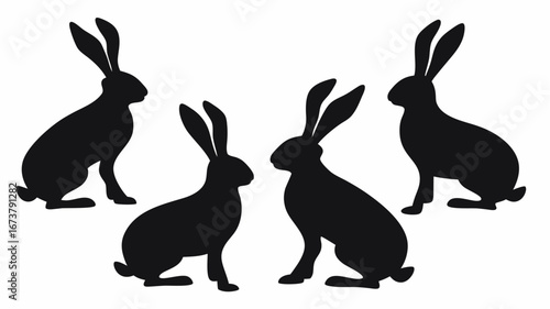 Four black silhouettes of rabbits with long ears arranged on a white background in a simple style | editable eps vectors