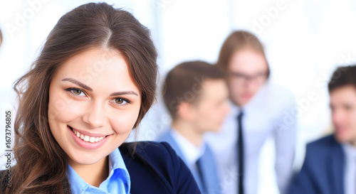Confident young caucasian female executive leading a business meeting with colleagues in office. Free Download Confident young caucasian female executive leading a business meeting with colleagues in office. - GFXLoad