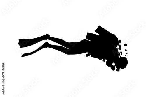 Silhouette of a scuba diver diving deeper into the water
