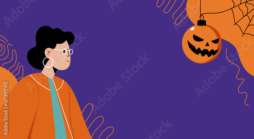 Modern person in an orange jacket looks at a hanging Halloween jack-o'-lantern ornament and spider web. Perfect for seasonal marketing.