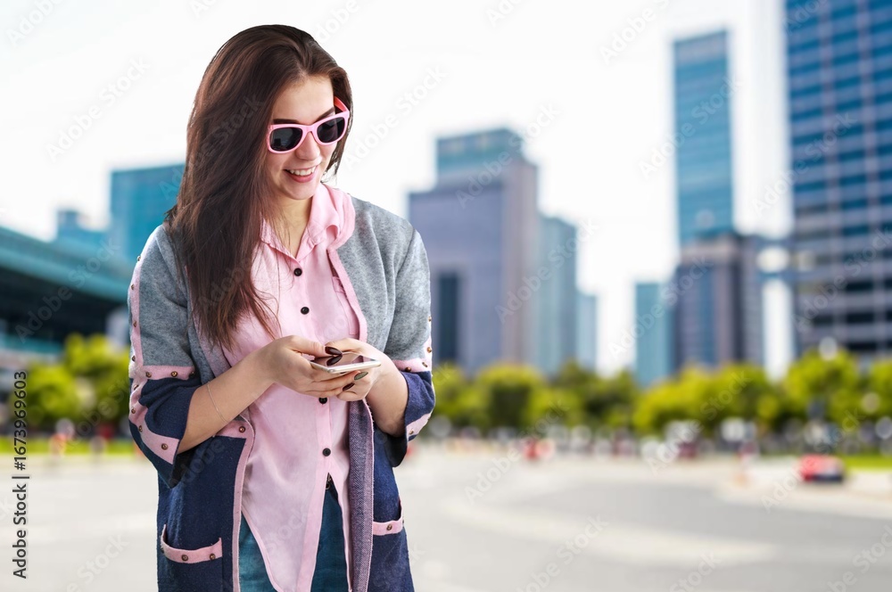 Fototapeta premium Young beautiful woman in trendy clothes posing