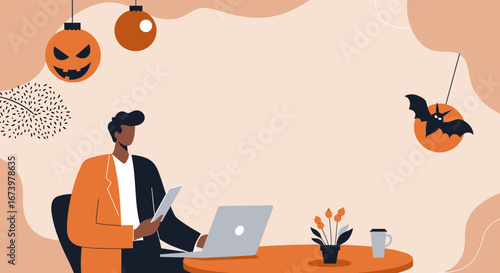 Focused man works on a laptop with festive Halloween decorations creating a seasonal business and remote work concept.