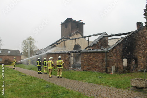 Firefighters after the church fire in 52399 Bürgewald (Morschenich-Alt), NRW, Germany, on April 17, 2023