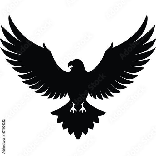 Black silhouette of a bird of prey with wings spread