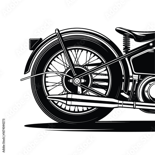 Close up detail of a vintage motorcycle rear wheel and exhaust pipe
