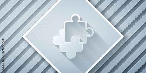 Paper cut Puzzle pieces toy icon isolated on grey background. Paper art style. Vector