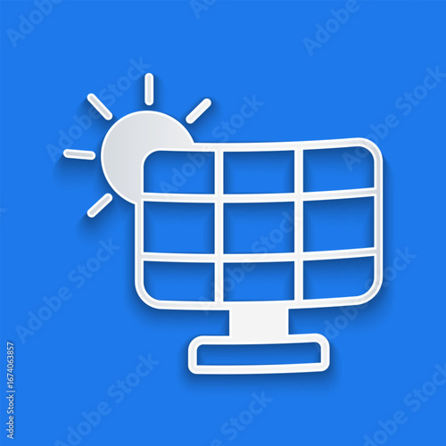 Paper cut Solar energy panel icon isolated on blue background. Paper art style. Vector