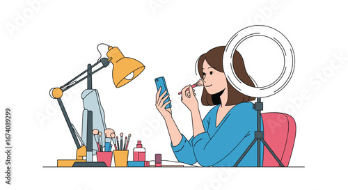 Young woman applying makeup in front of a ring light preparing for online content creation and live streaming session