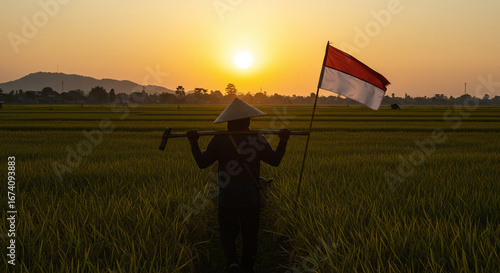 Indonesian Farmer Carries Flag Through Rice Field Sunset