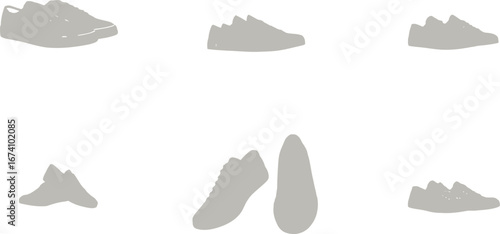 Collection of grey shoe silhouettes on white background