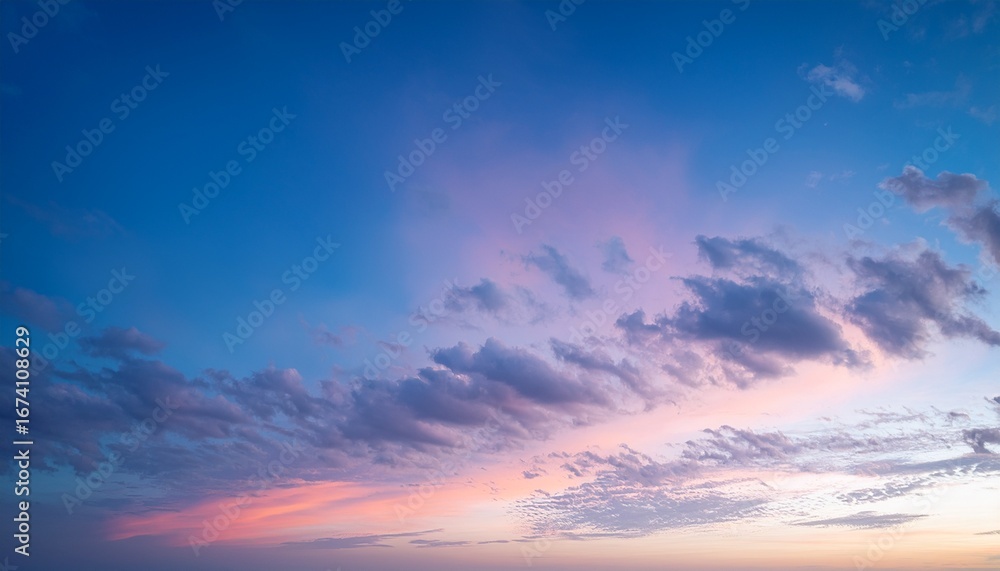 Obraz premium dreamy pastel sky and cloudscape scene at dawn or dusk creates a tranquil and calming aesthetic ideal for design projects needing a serene backdrop