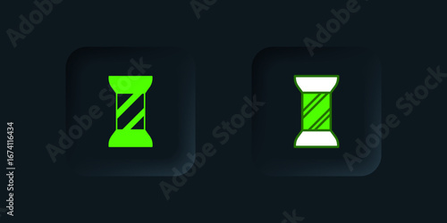 Green Sewing thread on spool icon isolated on black background. Yarn spool. Thread bobbin. Black square button. Vector