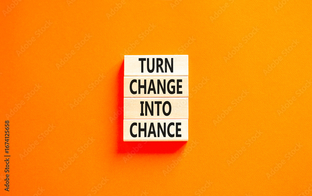 Turn change into chance symbol. Concept words phrase Turn change into chance on beautiful wooden blocks. Beautiful orange paper background. Business Turn change into chance concept. Copy space. Turn change into chance symbol. Concept words phrase Turn change into chance on beautiful wooden blocks. Beautiful orange paper background. Business Turn change into chance concept. Copy space.