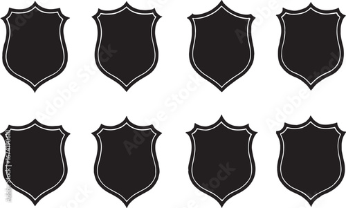 Eight black shield shapes with white outlines on a white background emblem badge