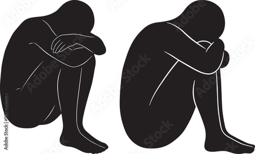 Two figures in a fetal position silhouette