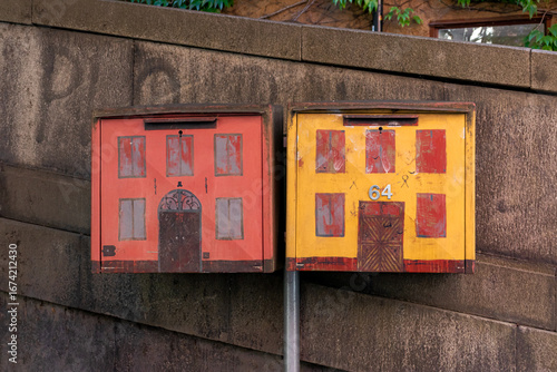 Photography Two traditional painted apartment mailboxes in Stockholm's Gamla Stan (Old Town)
