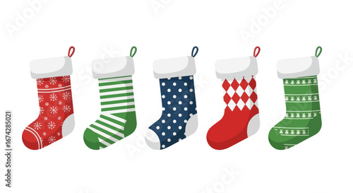 Festive array of christmas stockings in red, green and blue ready for presents