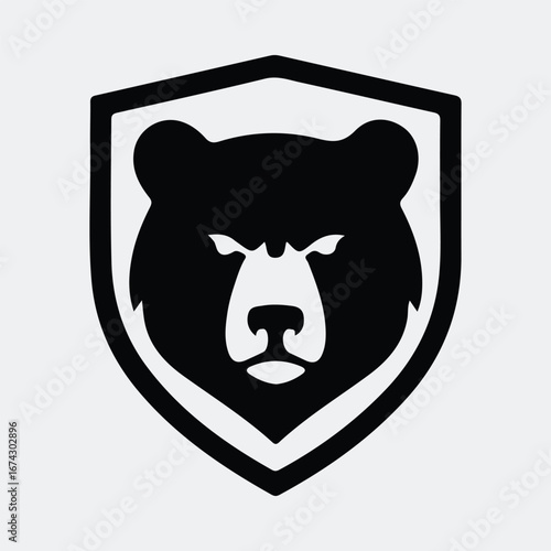 Silhouette bear head within shield emblem logo design vector illustration