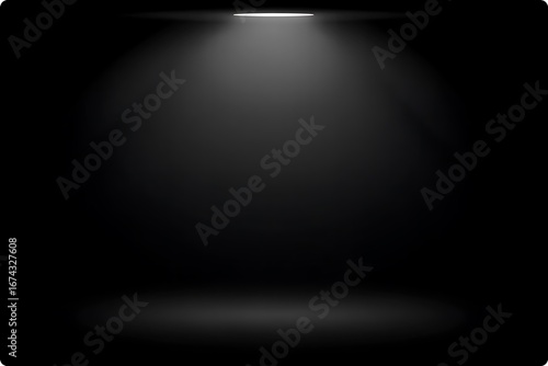 Spotlight illuminating a dark stage with a subtle spotlight effect