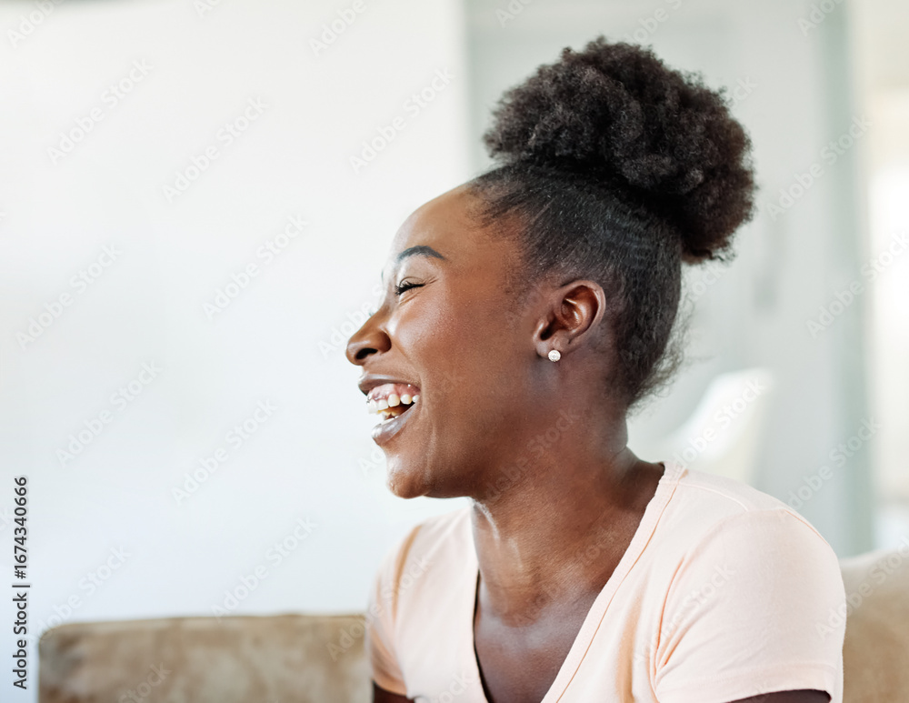 Obraz premium Portrait of a lovely young couple having fun and laughing sharing a donut and eating together at home