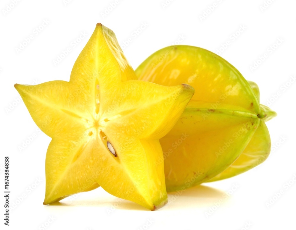 Fototapeta premium Ripe carambola fruit cut open showing star shape on white surface