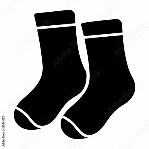 Pair of warm black socks with white stripes to keep feet cozy